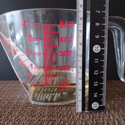 横から見た内径約8.2㎝のおたま1杯分106gのみりん