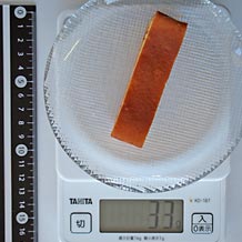 セブンイレブンのベイクドチーズケーキを切ったもの