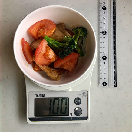 100gのトマトと豚肉の炒め物 100g